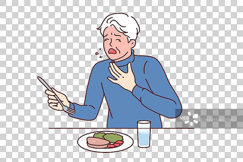 老人被食物噎住，咳嗽并需要帮助图片素材