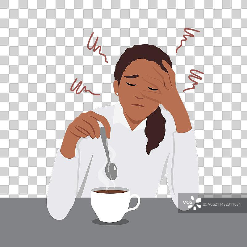 疲惫地坐在桌旁喝咖啡的年轻女人图片素材