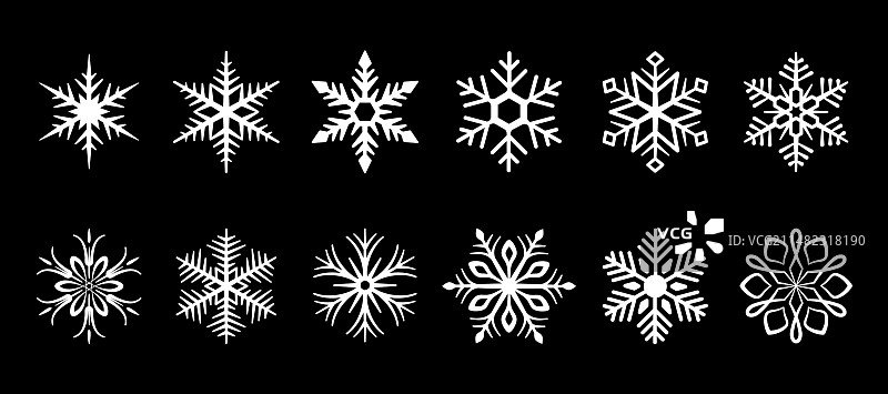 黑色背景上的白色雪花图案图片素材