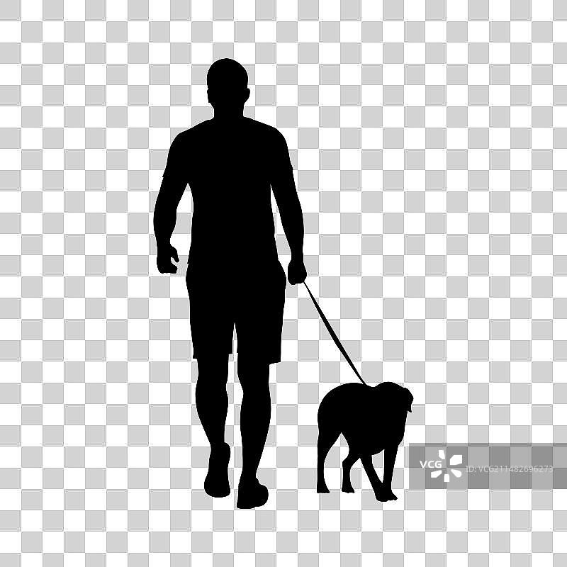 男子遛狗剪影图片素材