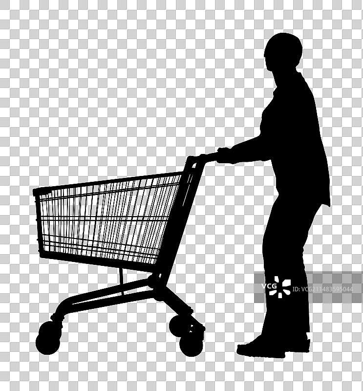 推着购物车购物的女人剪影图片素材