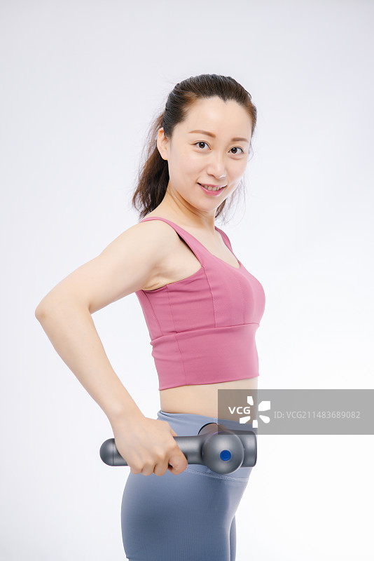 白色的背景下 身穿运动装的亚洲女性 青春活力 魅力四射图片素材