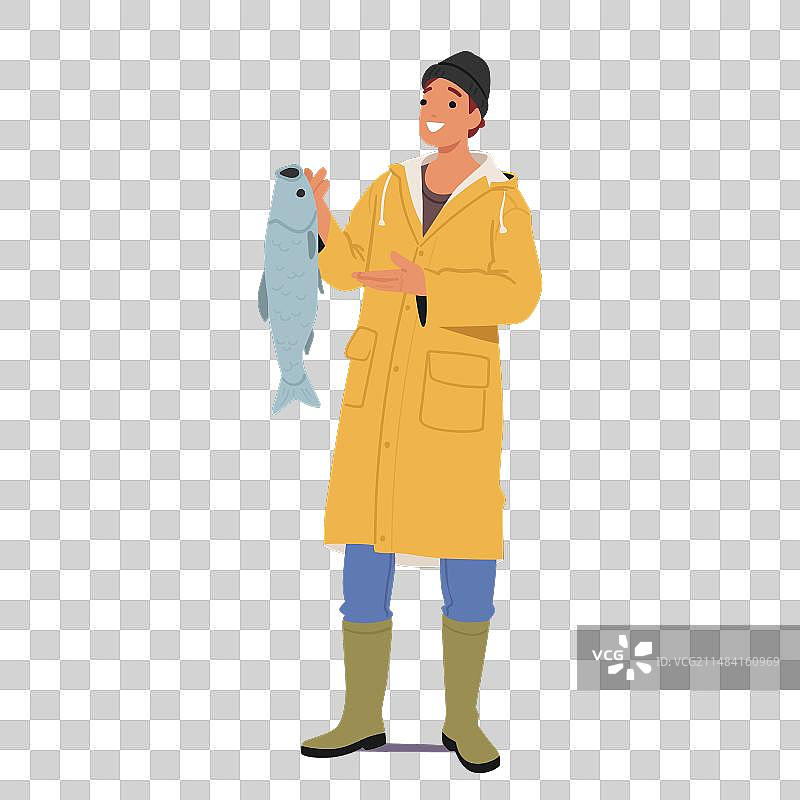 骄傲的渔夫展示他令人印象深刻的渔获图片素材