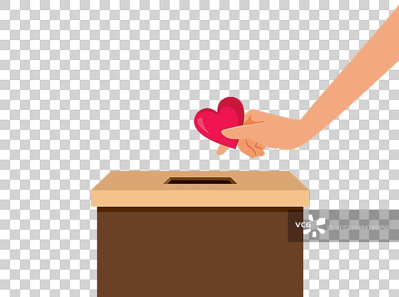 向捐款箱里投爱心的人图片素材