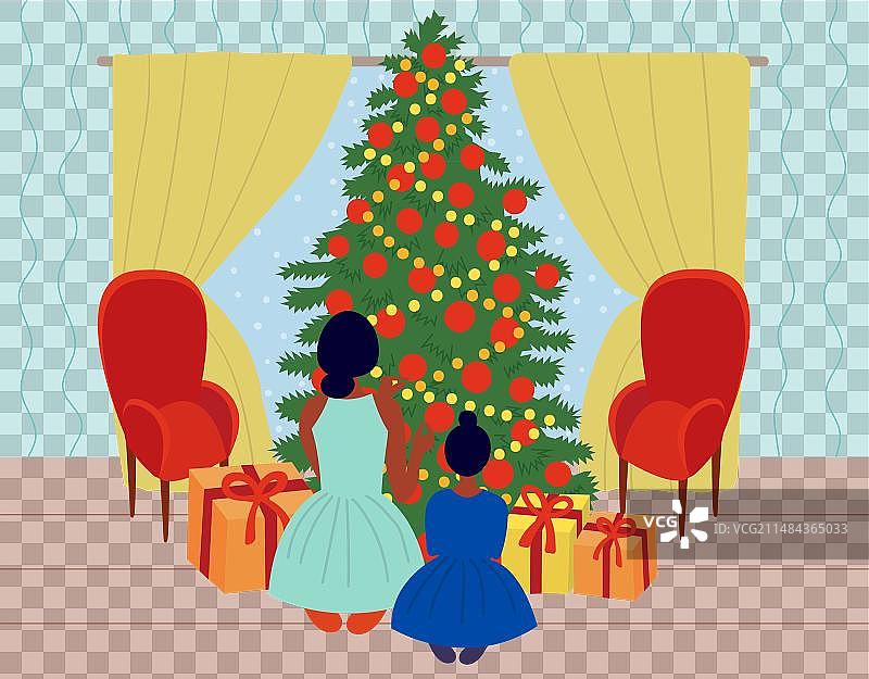 母亲和孩子装饰圣诞树图片素材