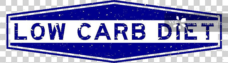 蓝色垃圾摇滚风格“低碳饮食”文字六边形橡胶印章图片素材