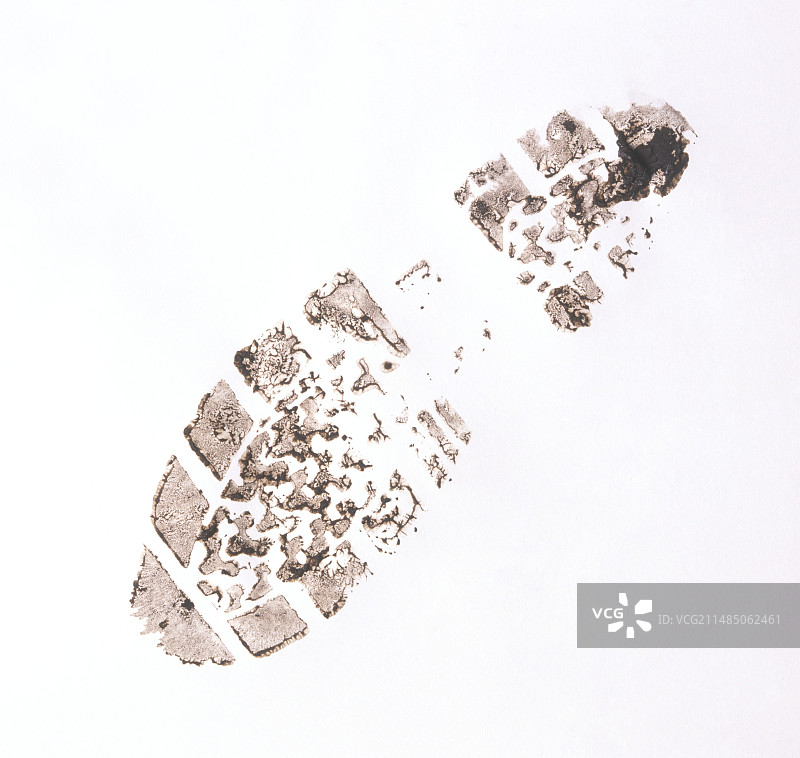 泥泞的鞋印特写图片素材