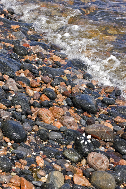 海岸岩石和鹅卵石图片素材