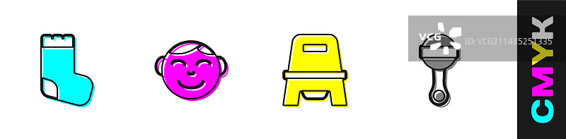 婴儿袜子小男孩头部便盆和拨浪鼓图片素材