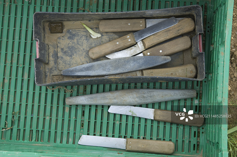 农用刀具和磨刀石图片素材