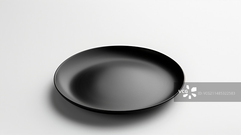 一个黑色的盘子白色背景图片素材