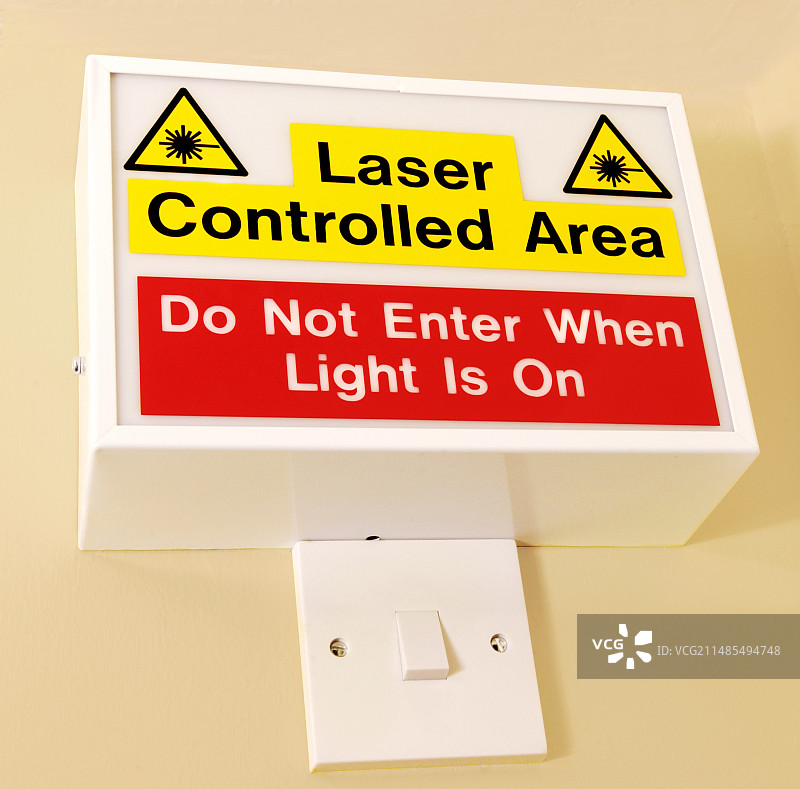 激光警告标志图片素材