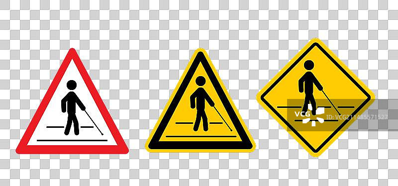 盲人手持白色手杖过马路图片素材