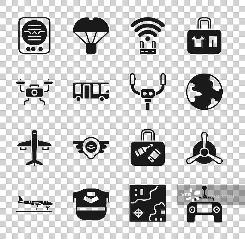 无人机遥控器、飞机和螺旋桨组合图片素材