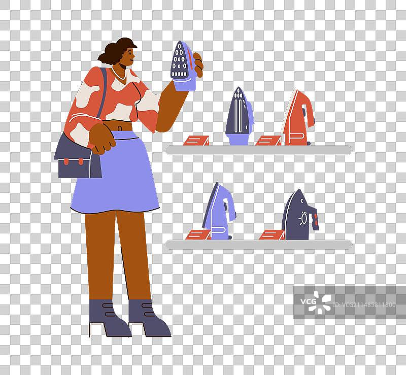 微笑的女人在电器商店挑选熨斗图片素材
