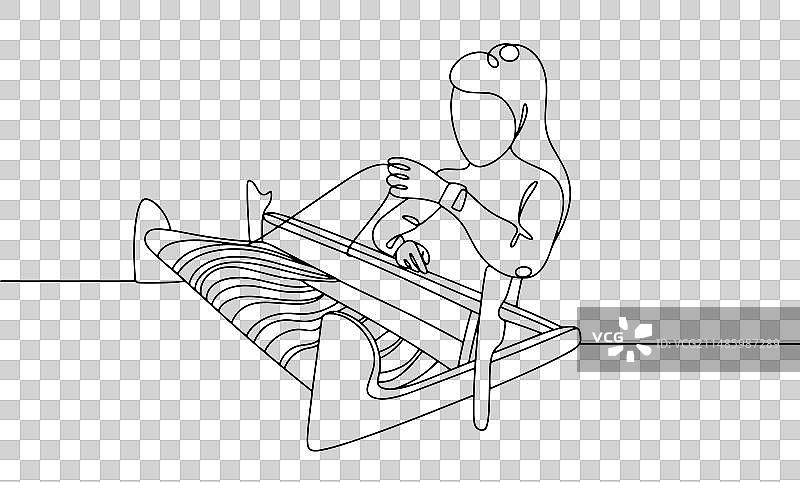 纺织女工使用织布机图片素材