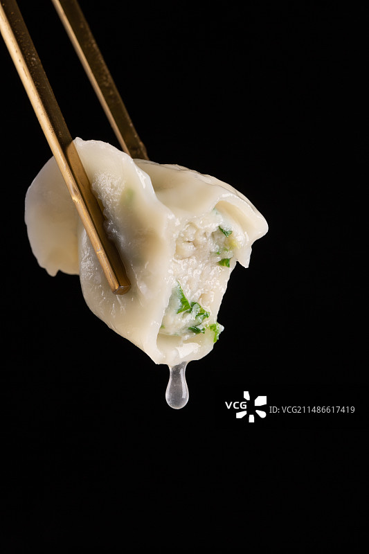 咬了一口的饺子图片素材