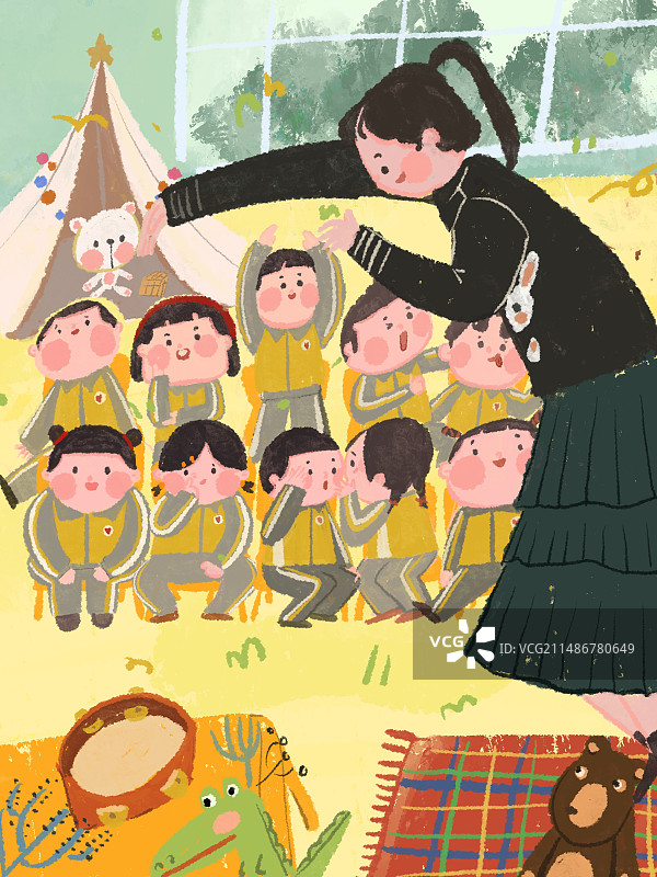 幼儿园里老师正在教导一群小朋友唱歌游戏图片素材