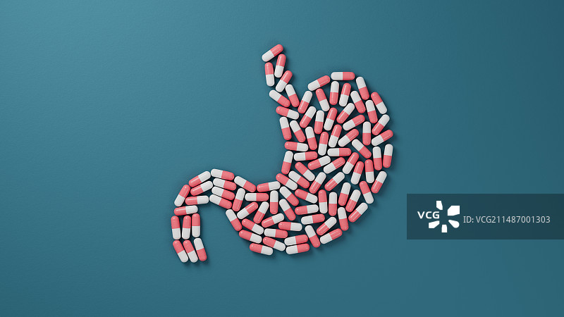 一堆胶囊药品摆放成一个胃的形状图片素材