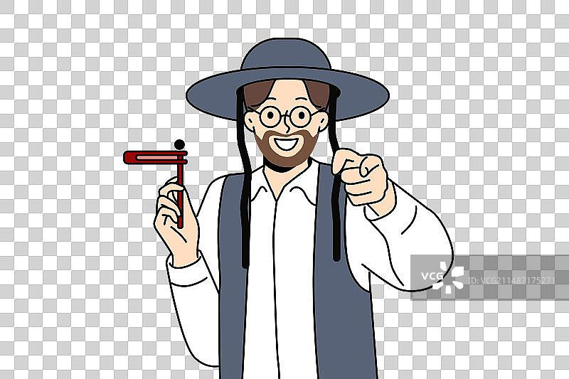 手持拨浪鼓的东正教犹太男人图片素材