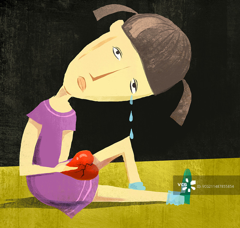 哭泣的小女孩，手捧破碎的心图片素材