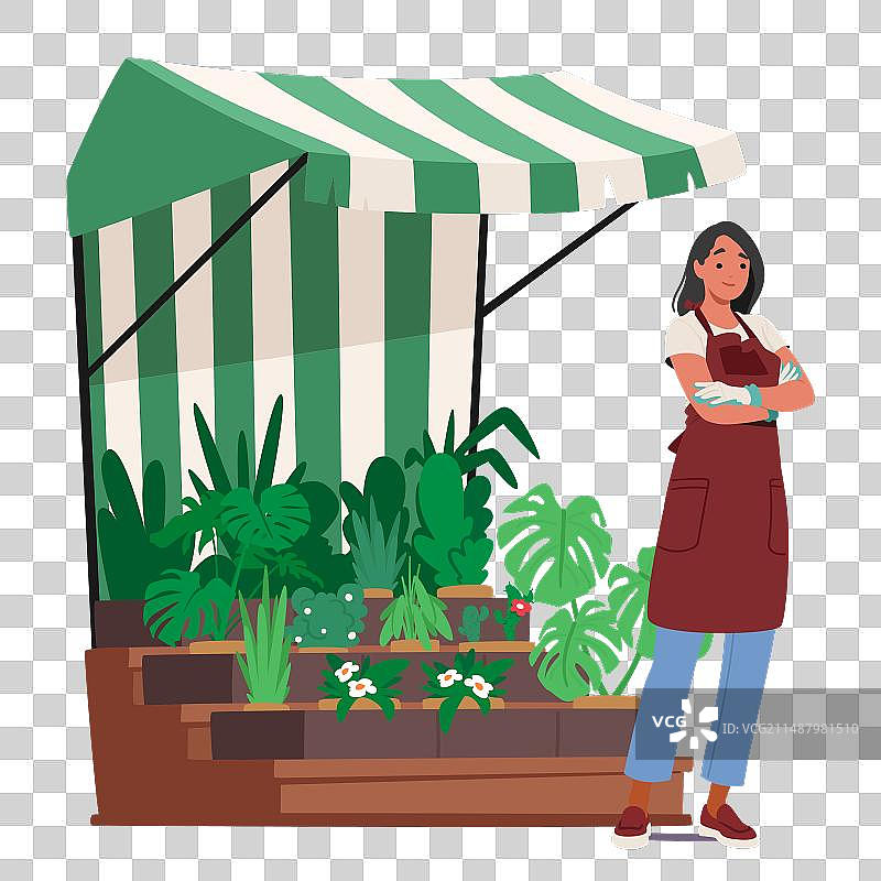 围着围裙和在花园里的女花店图片素材