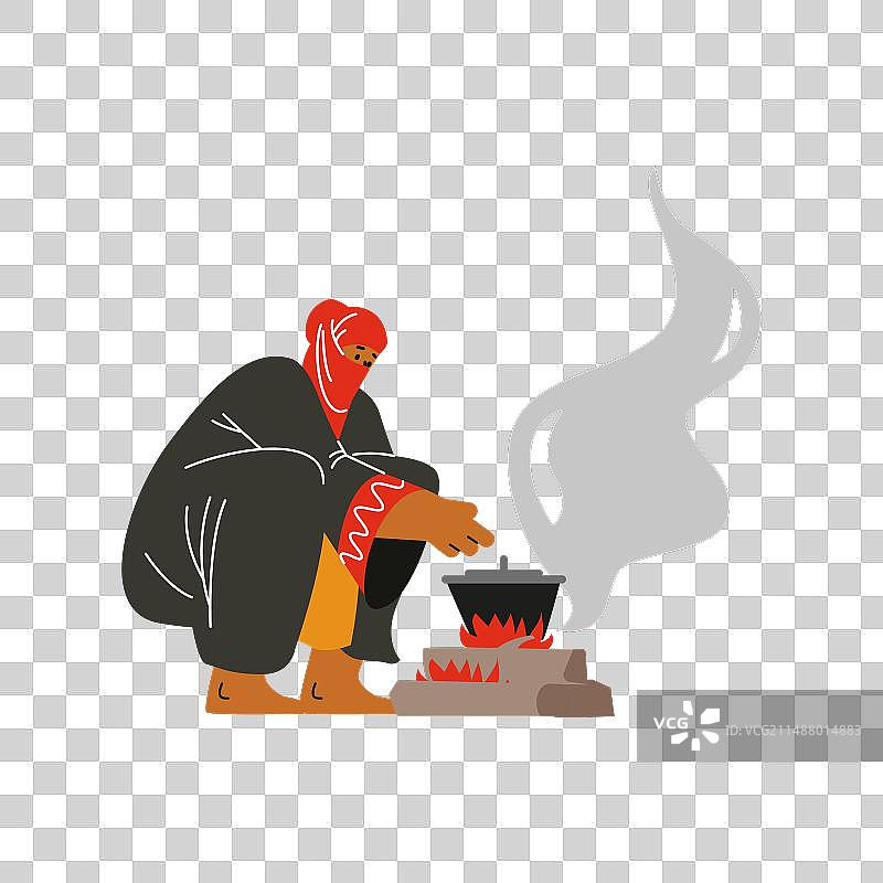 穿着阿拉伯传统服装的贝都因人正在烹饪图片素材