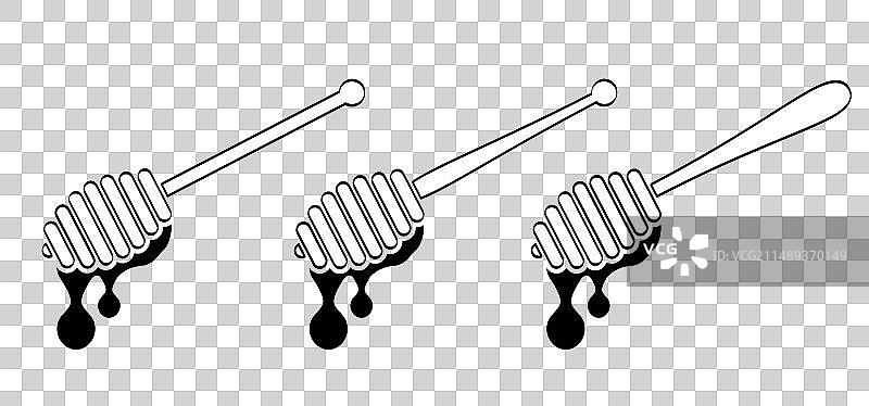 蜂巢的木制蜂蜜棒图片素材