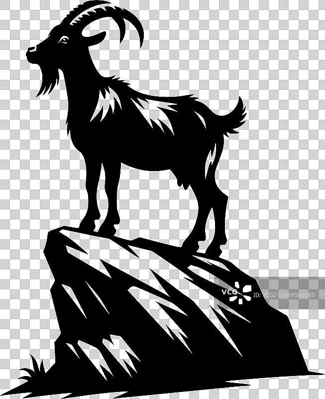 岩石山峰上雄伟的山羊图片素材