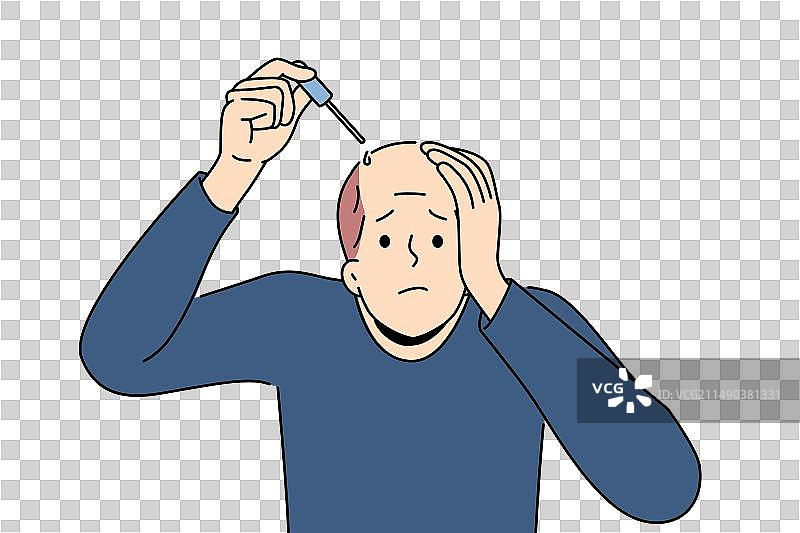 男人用滴管治疗脱发图片素材