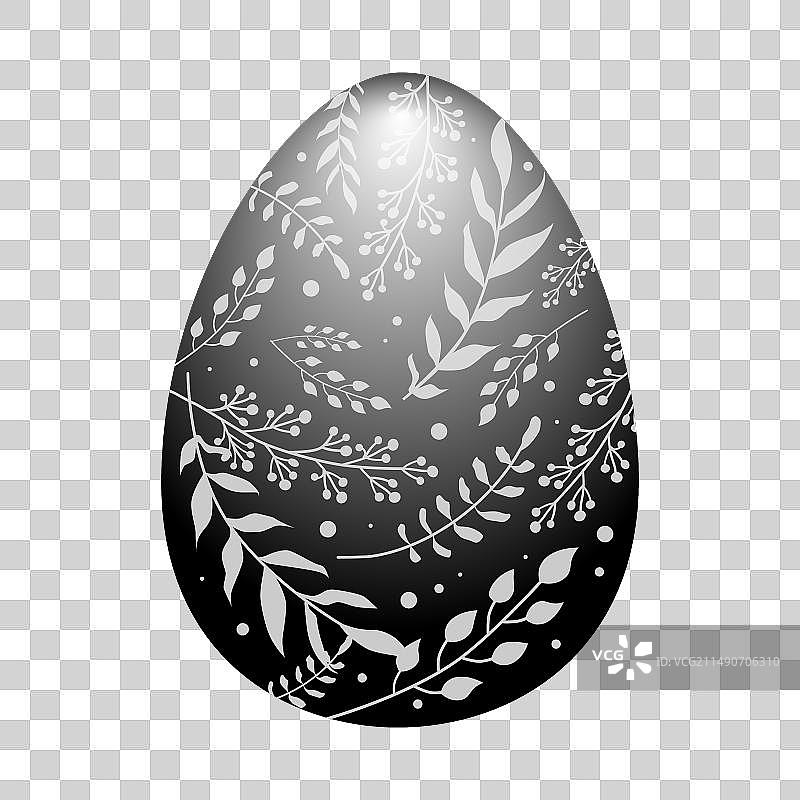 带有白色叶子图案的黑色复活节彩蛋图片素材