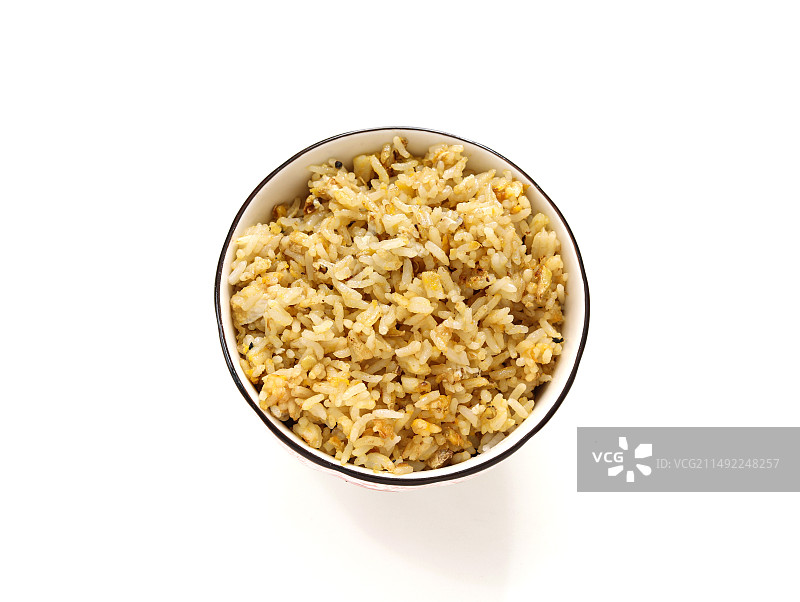 白色桌面上的一碗粮食大米饭的特写图片素材