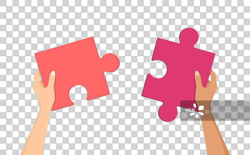 女人手拿着珊瑚色和粉色的拼图块图片素材