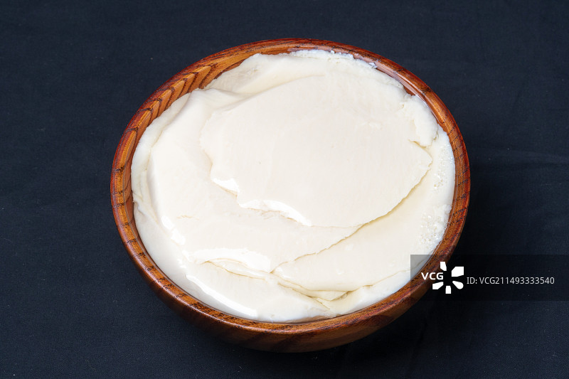 白背景的中国传统小吃豆腐脑豆花 黄豆制品图片素材