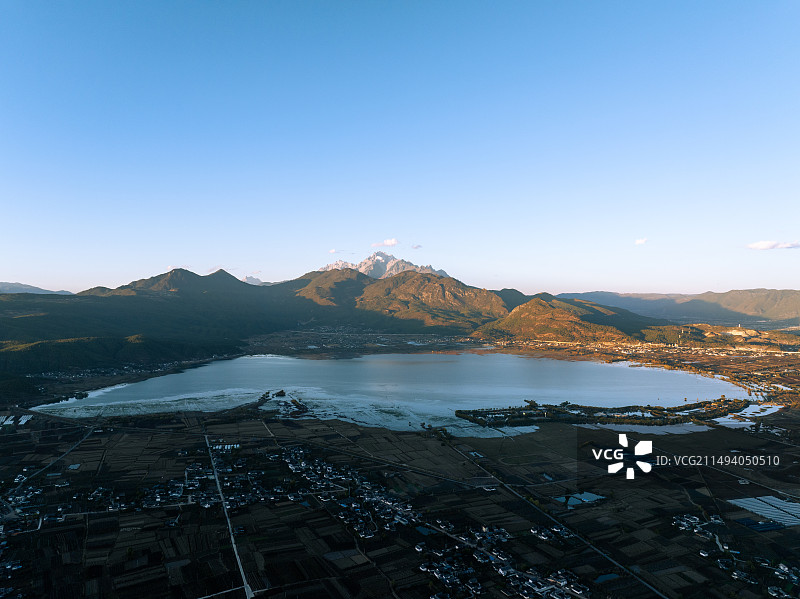 玉龙雪山与拉市海日落图片素材