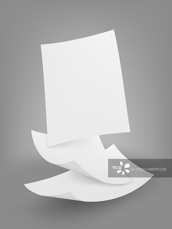 灰色背景上漂浮的空白A4纸图片素材