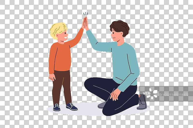 父亲通过击掌来支持年幼的儿子图片素材