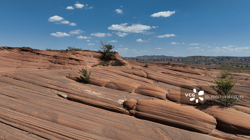 陕西榆林市波浪谷火焰丹霞洛河组砂岩航拍图片素材