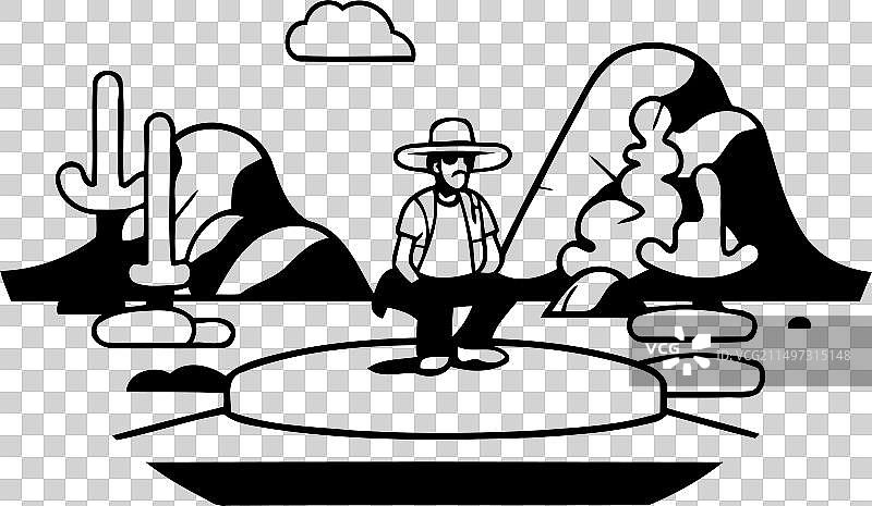 戴牛仔帽的男人坐在岩石上图片素材