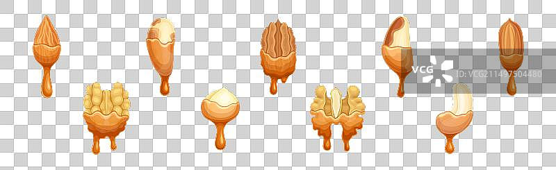 滴着巧克力或焦糖的可食用坚果种子图片素材