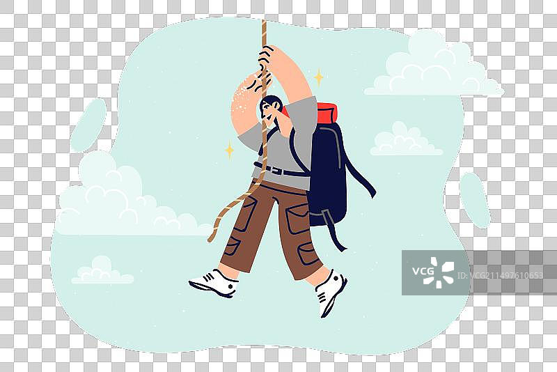 男人攀爬悬挂在空中的绳索图片素材
