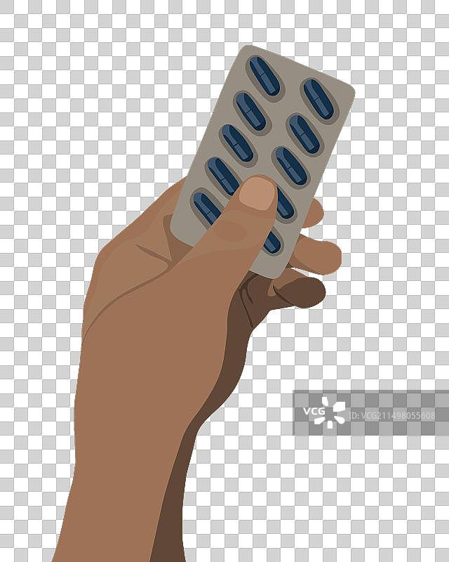 手中的药丸包装提醒图片素材