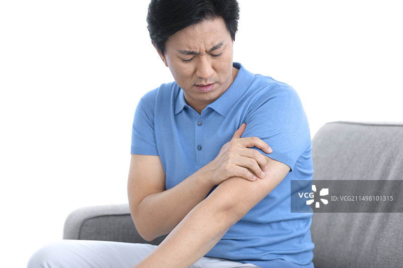 手臂疼痛的男人图片素材
