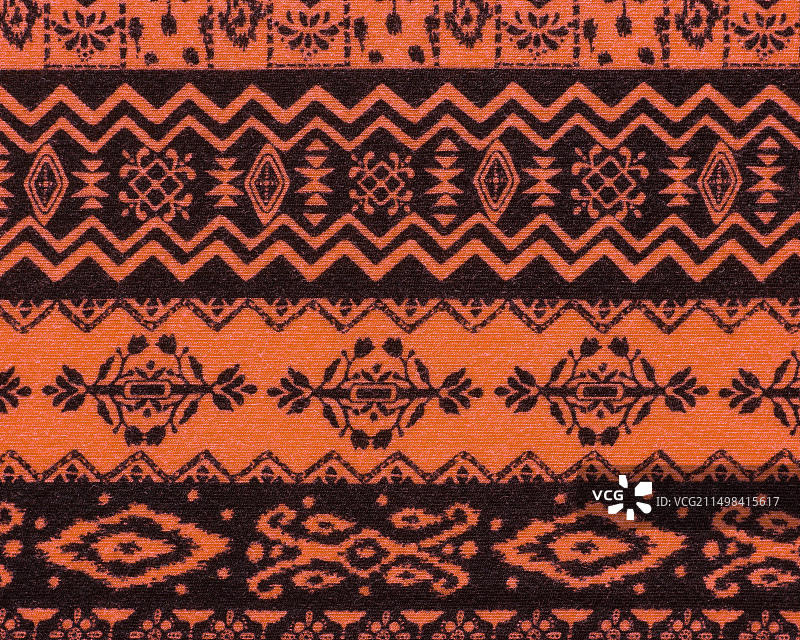橙黑色波西米亚风复古布料纹理背景图片素材