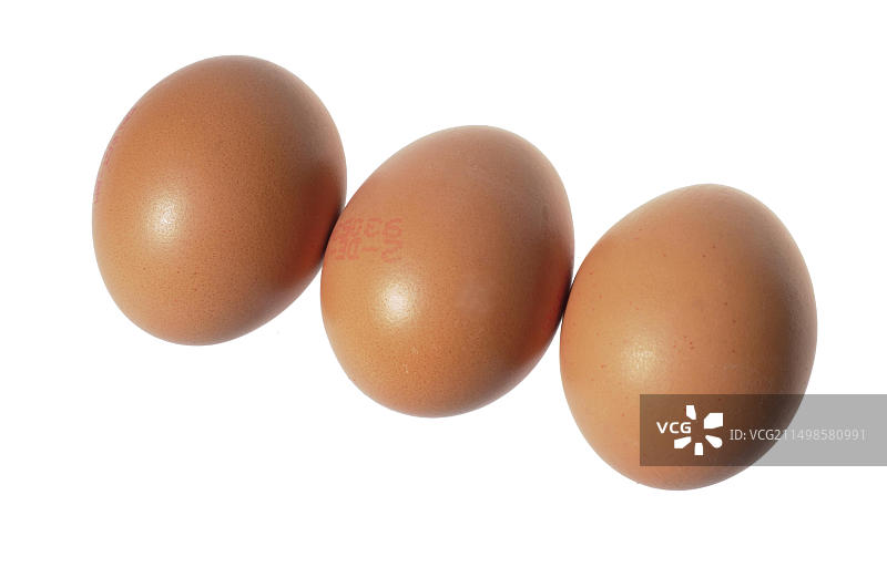三颗棕色鸡蛋图片素材