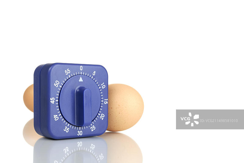 鸡蛋定时器和棕色鸡蛋图片素材