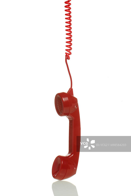 红色电话听筒悬挂图片素材