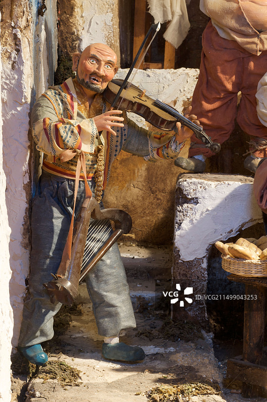 那不勒斯耶稣床小提琴演奏者图片素材