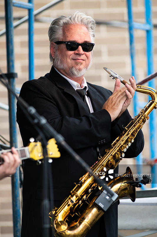 罗西和铆钉乐队在杰斐逊公园哥白尼中心波兰美食节上演出图片素材