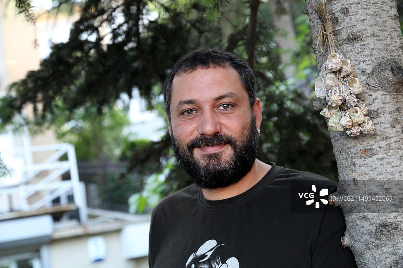 土耳其音乐家许斯努·森伦迪里奇肖像图片素材